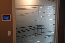 Custom sandblasted glass passage doors