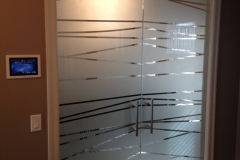 Custom sandblasted glass passage doors