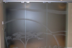 Custom-sandblasted-glass-sliding-partitions