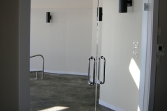 Frameless glass doors for pool entrance