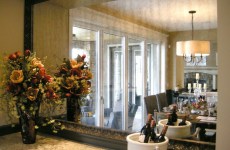 Framed_antique_mirror_in_dining_room