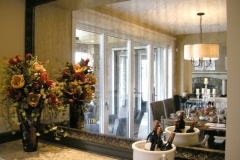 Framed_antique_mirror_in_dining_room
