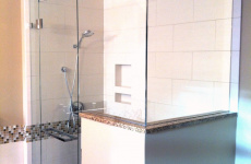 Glass shower door with pony wall