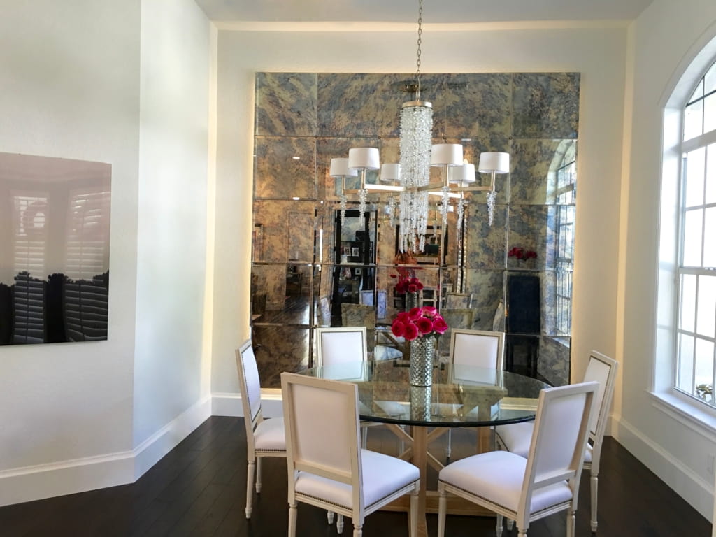 Dinning room antique mirrored wall.