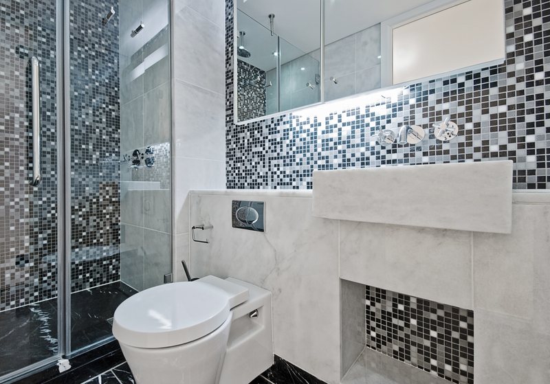Grid-Style Metal Cladded Shower Doors - House of Mirrors and Glass - Mirrors and Glass in Calgary