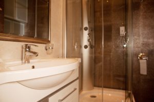 How Frameless Shower Doors can Modernize your Bathroom - House of Mirrors - Mirrors and Glass Calgary