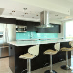 Why Choose a Glass Backsplash For Your Kitchen? - House of Mirrors - Mirrors and Glass Store - Featured Image