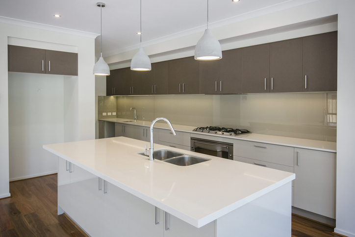 A kitchen space featuring recycled glass countertops.