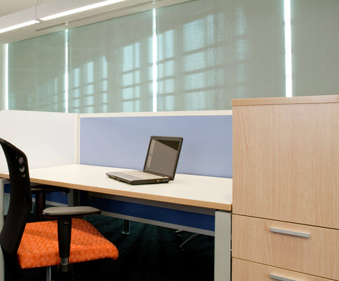 A home office with back-painted glass for an elegant, professional look.