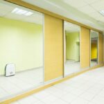 Adding mirrors for schools hallways can create a functional environment for both students and staff.