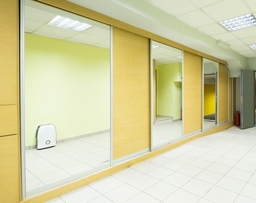 Adding mirrors for schools hallways can create a functional environment for both students and staff.