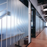 Frosted glass partitions in residential spaces offer an elegant way to enhance both privacy and style.